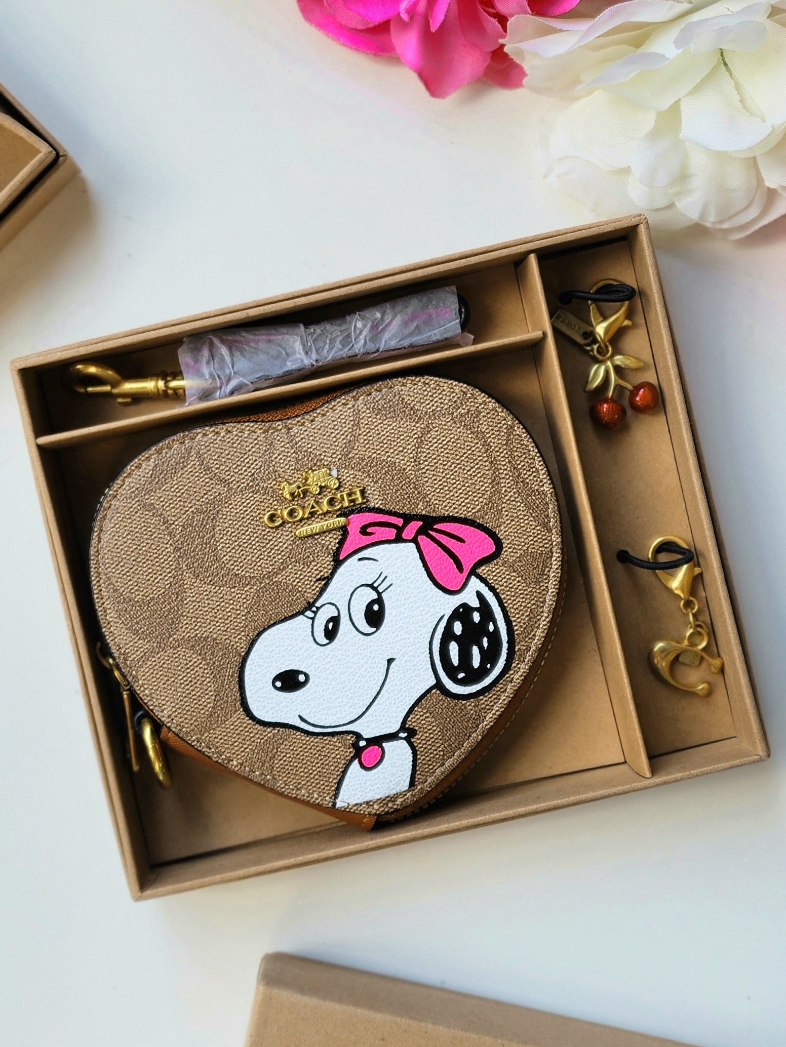 Muñequera  corazón Coach