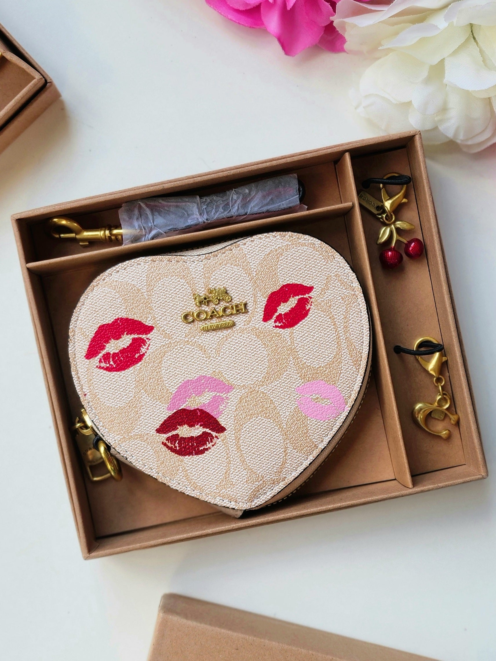 Muñequera  corazón Coach